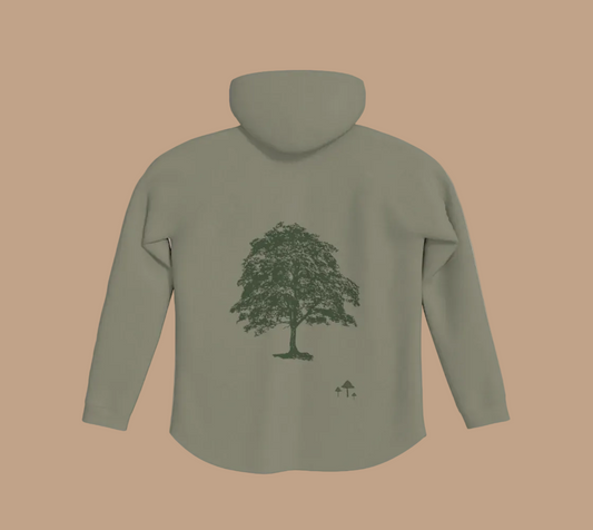 Sage green hoodie with a tree and mushroom motif on the back.