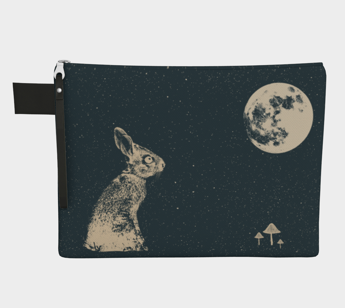 Blue zippered pouch with a rabbit looking at the moon and a trio of mushrooms.