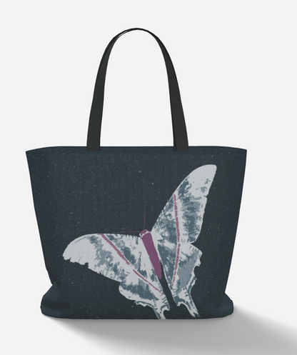 Large tote bag with purple and blue moth on a navy background with stars.