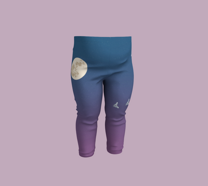 Front of baby leggings with blue and purple gradient featuring a moon on the right hip and moth flying in a crescent on the left leg. Size for a 6 month old.