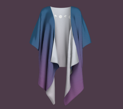 Blue and purple gradient coverall with moon phase motif on the back.