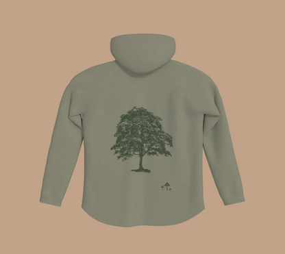 Sage green hoodie with a tree and mushroom motif on the back.
