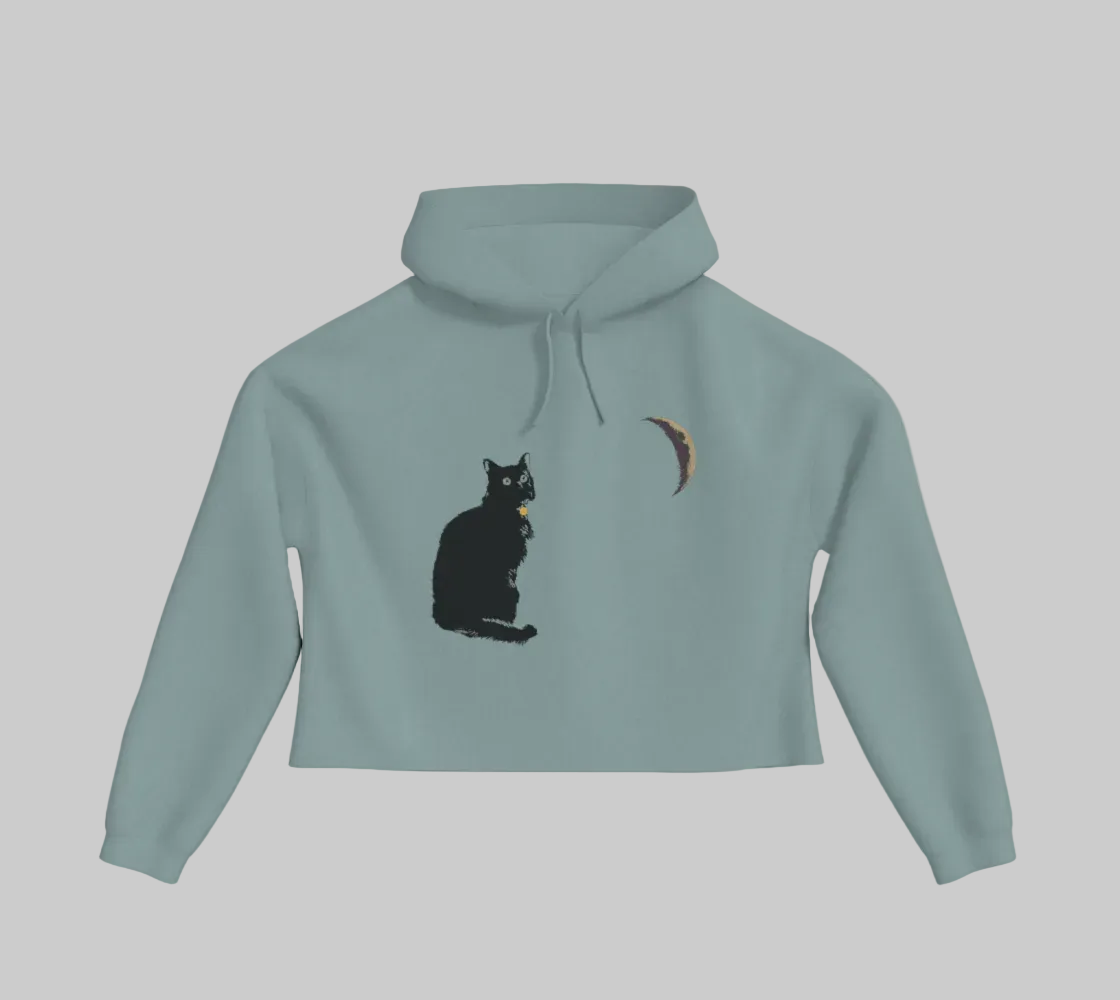 Sage green cropped hoodie with a black cat and crescent moon on the front.